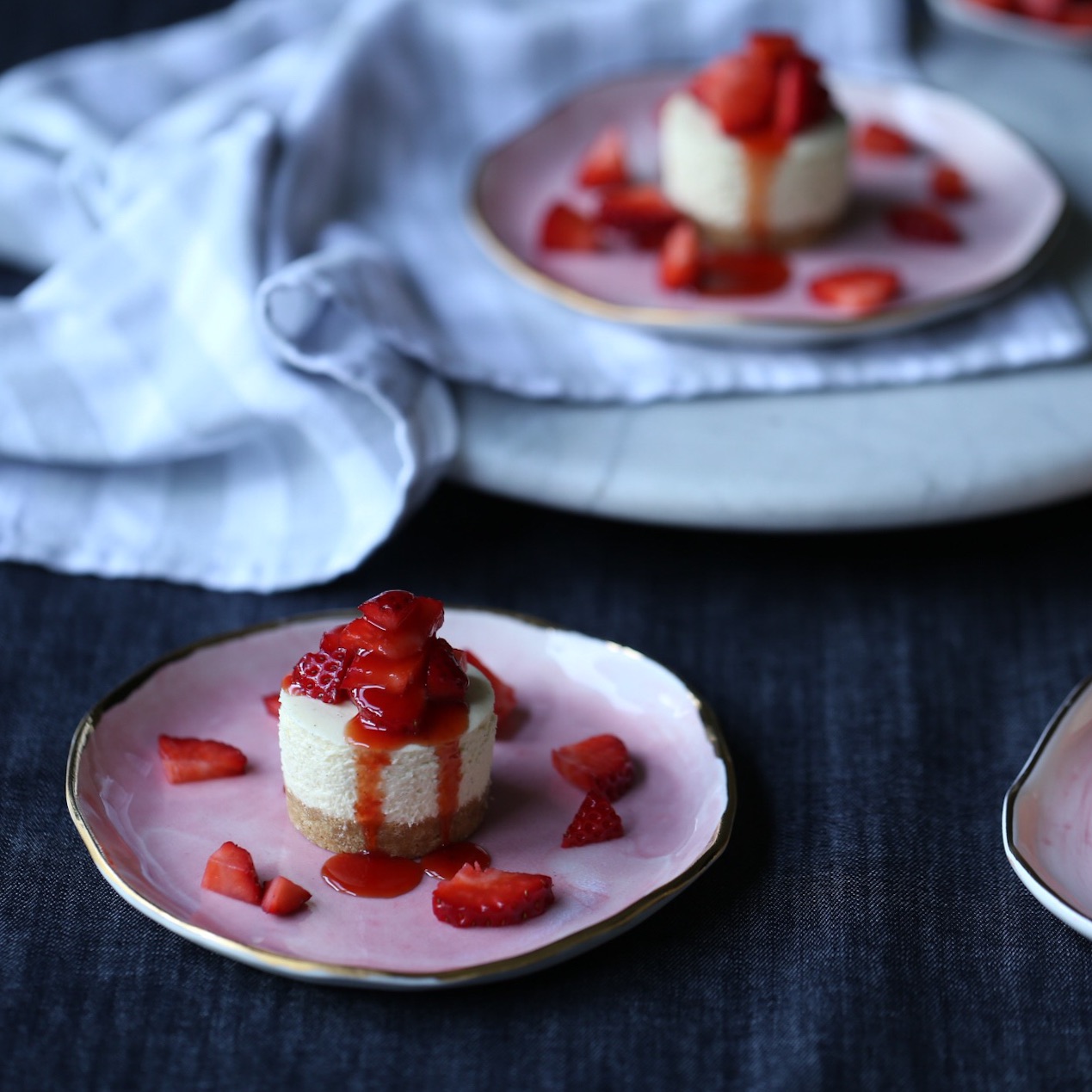 White Chocolate and Strawberry Mini Cheesecakes with Blood Orange Syrup